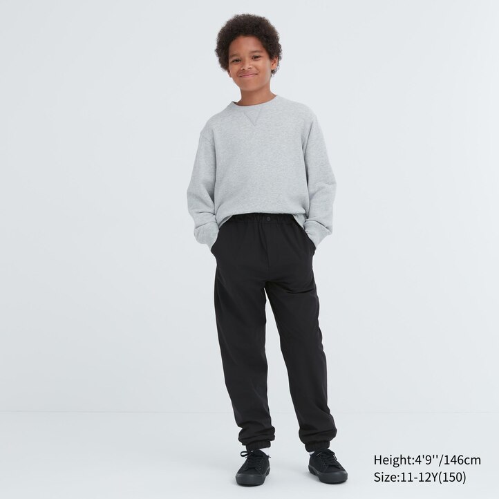 UNIQLO Warm Stretch Lined Joggers Svarte | 05TUCSWPV